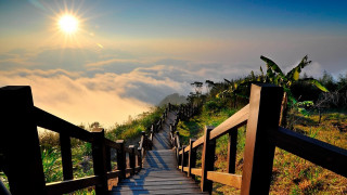 Wooden walkway mountain sunset sky - a wooden walkway free wallpaper
