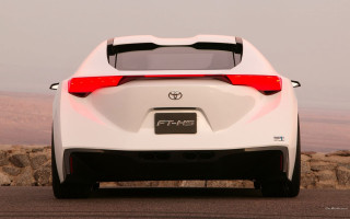 White car parked road rocky - back view free wallpaper