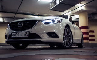 White car parking garage license - bumper free wallpaper