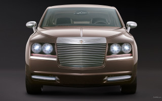 Brown car lights on black - a brown car free wallpaper for desktop