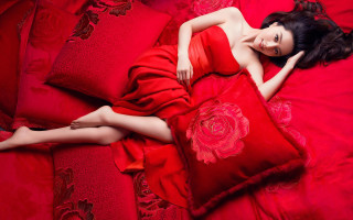 Red dress laying on red - a red pillow free wallpaper for desktop
