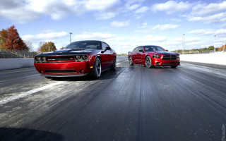 Red cars race track cloudy - blue sky free wallpaper for desktop