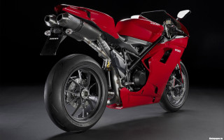 Red motorcycle dark room precisionism - a black background behind free wallpaper