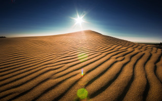 Desert sand dune sunlight lensflare - shining free wallpaper