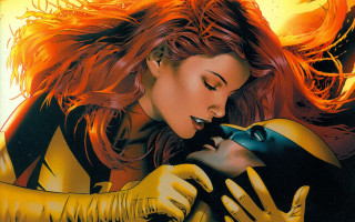 Woman yellow black catwoman touching - glove free wallpaper
