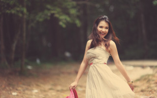 Cheerful woman in dress with - area free wallpaper