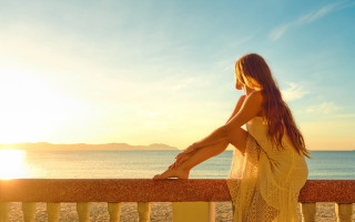 Woman ocean sunset sitting beach - sunrise free wallpaper for desktop