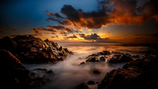 Sunset rocky beach clouds urban - a few rock free wallpaper