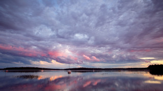 Lake boat clouds sunset cityscape - colorful cloud free wallpaper