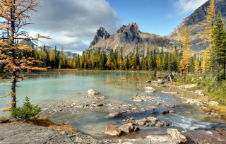 Mountain lake forest rocks cloudy 3 - a mountain lake free wallpaper