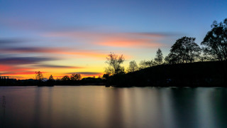 Sunset lake trees hill clouds - tree and a hill in the background free wallpaper