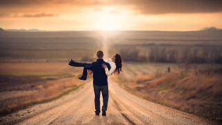 Romantic man carrying woman dirt - daren bader free wallpaper