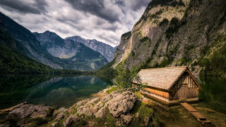 Cabin cliff lake mountains clouds - a lake and mountains free wallpaper