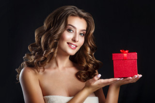 Woman holding red gift box - airbrush free wallpaper