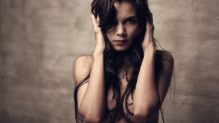 Woman wet hair hands head - eye contact free wallpaper