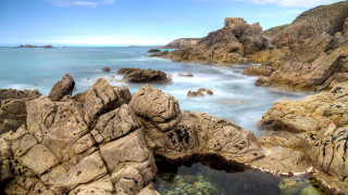 Rocky beach water rocks sky - a rocky beach free wallpaper
