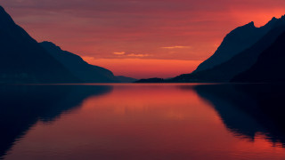 Red sky reflection mountains lake - the water of a lake free wallpaper