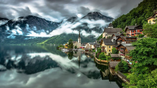 Lake mountains houses cloudy sky - a church free wallpaper for desktop