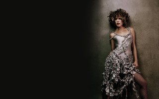 Woman dress flower wall crossed 2 - against a wall free wallpaper