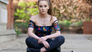 Woman sitting floral jeans portrait - floral free wallpaper for desktop