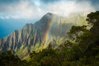 Rainbow mountain horizon nature water - a rainbow in the sky above free wallpaper
