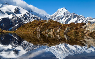 Mountain range lake coast clouds - photograph free wallpaper for desktop