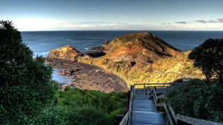 Wooden staircase rocky cliff ocean - a rocky cliff free wallpaper