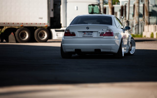 White car parking lot truck - a parking lot next free wallpaper