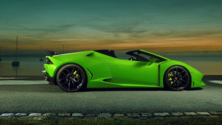 Green sports car waterfront sunset - a boat in the background free wallpaper for desktop