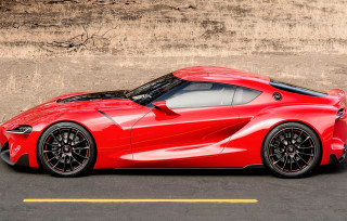 Red sports car side road - a yellow line free wallpaper