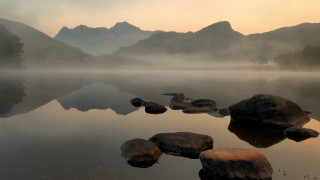 Lake rocks mountains fog sunset 3 - the water and mountains free wallpaper