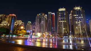 City skyline fountain night architecture - a city skyline free wallpaper