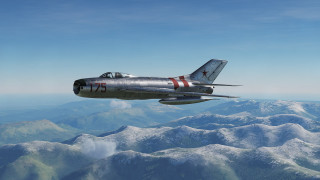 Fighterjet mountainrange sky bluehorizon ocean - over a mountain range in the sky free wallpaper