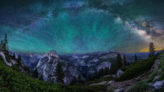 Night sky milkyway mountains forest - a forest below free wallpaper