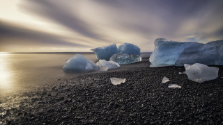 Icebergs beach ocean cloudy sky 2 - top of a beach next free wallpaper
