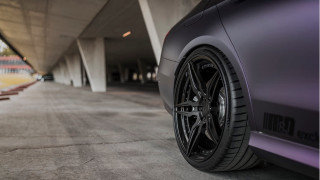 Car tire parking lot ramp - a close up of a car tire free wallpaper