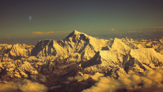 Mountain range moon clouds autumn - an airplane window free wallpaper