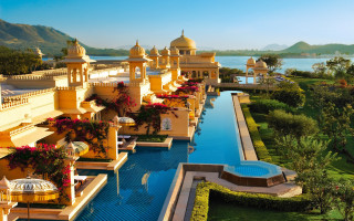 Large pool yellow buildings lake 3 - a few flower free wallpaper