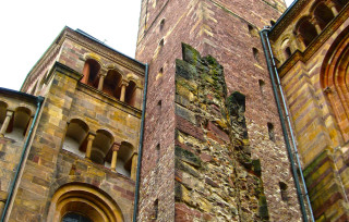 Tall brick building clock romanesc - face and a clock free wallpaper