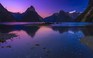 Mountain reflection purple sunset aurora - free beach wallpaper
