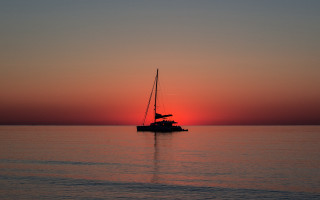 Boat sailing sunset water dawn - visible free wallpaper