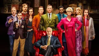 Group people man redchair yellowtie - promotional image free wallpaper