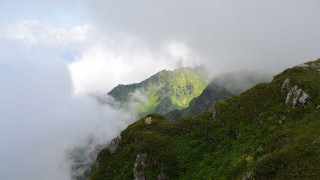 Mountain clouds sheep forest lake - a sheep free wallpaper