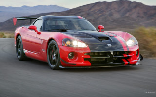Red sports car mountains cloudy - promotional free wallpaper for desktop
