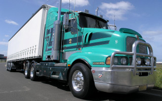 Green semi truck road grass - a field of grass free wallpaper for desktop