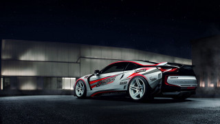 Sports car night city lights - a dark sky behind free wallpaper