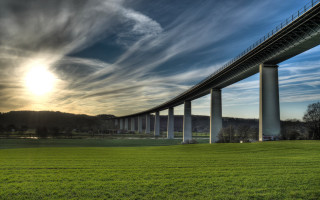 Bridge green field sunset clouds - photograph free wallpaper for desktop
