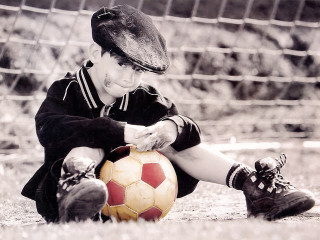 Young boy soccer ball glove - a young boy free wallpaper