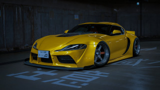 Yellow sports car night parking 2 - the front of it free wallpaper