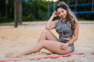 Beach woman sitting gray top - private press free wallpaper for desktop